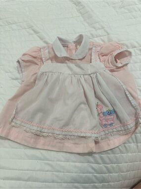 Baby Pink Dress with White Pinafore and Embroidered Cart